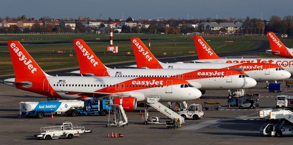  FILE PHOTO: EasyJet planes pictured at Tegel airport in Berlin, Germany, November 14, 2019. REUTERS/Fabrizio Bensch/File Photo 