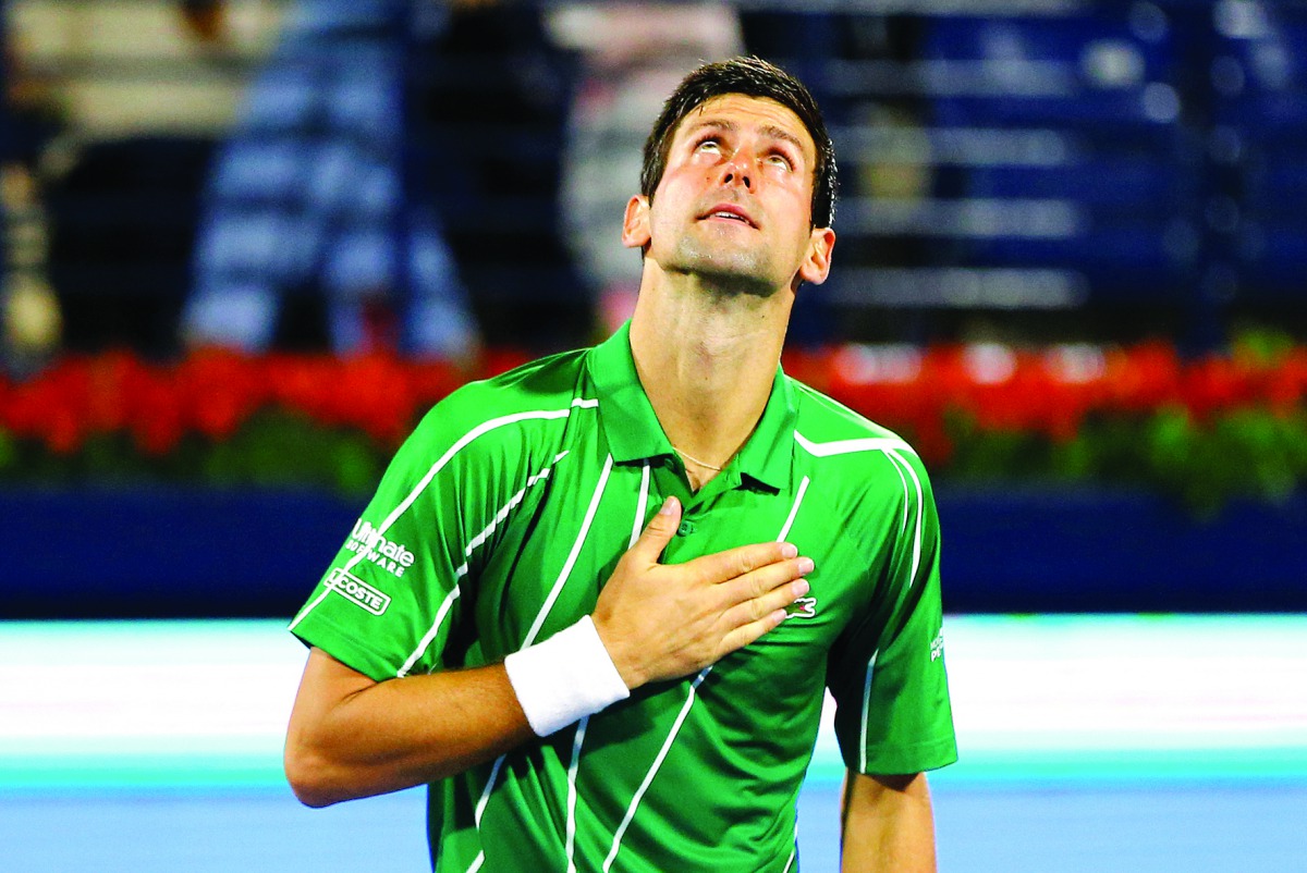 Serbia's Novak Djokovic celebrates winning his Semi Final match against France's Gael Monfils. Reuters/Thaier Al-Sudani