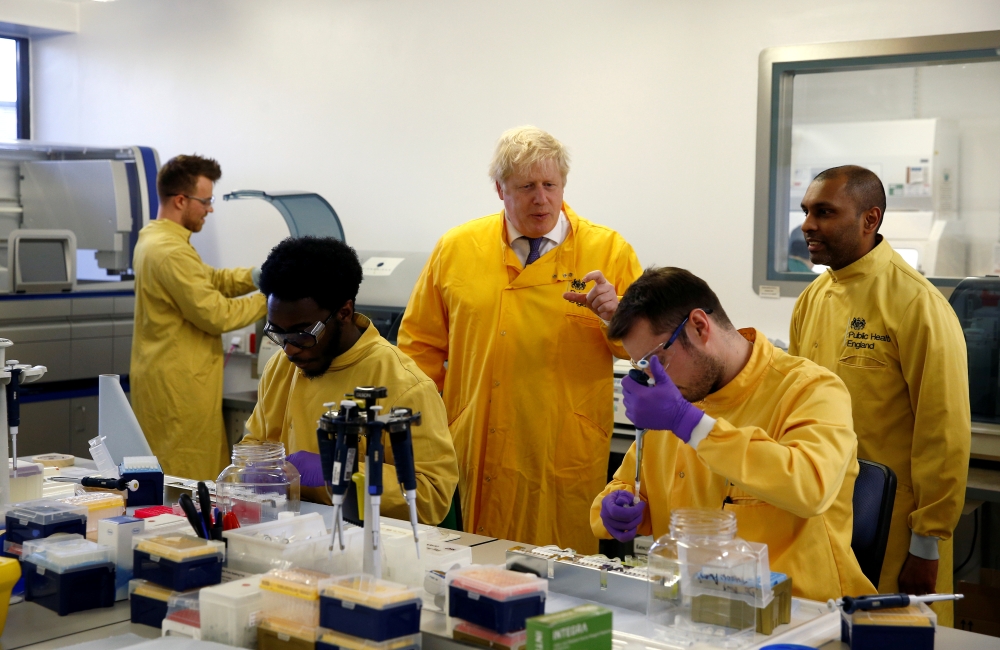 Britain's Prime Minister Boris Johnson visits a laboratory at the Public Health England National Infection Service in Colindale, north London, Britain, March 1, 2020. Reuters/Henry Nicholls