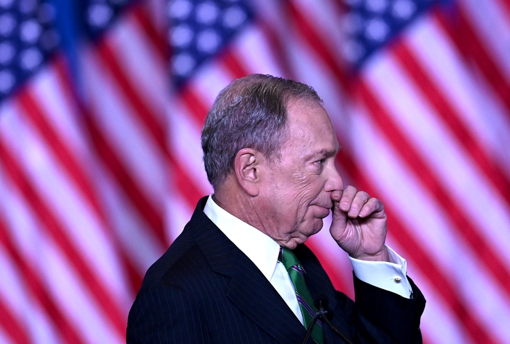 Former democratic presidential candidate and former New York City mayor Mike Bloomberg speaks to supporters and staff on March 4, 2020 in New York City. AFP / Johannes Eisele 
 