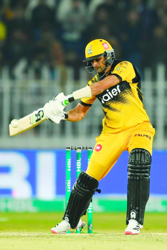 Peshawar Zalmi's Shoaib Malik plays a shot during the Pakistan Super League (PSL) T20 cricket match between Quetta Gladiators and Peshawar Zalmi at the Rawalpindi Cricket Stadium in Rawalpindi on March 5, 2020. AFP / Aamir Qureshi
