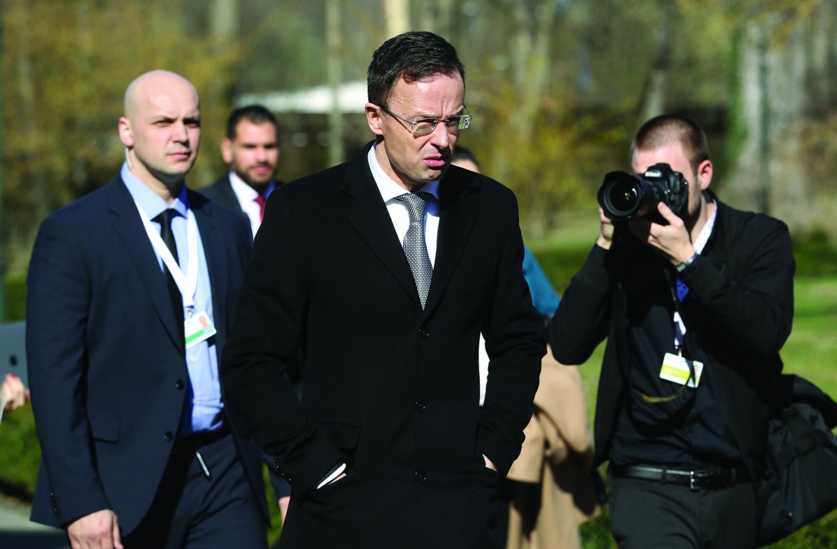 Hungary's Minister of Foreign Affairs and Trade Peter Szijjarto (C) arrives at the Informal meeting of EU Foreign Affairs ministers (Gymnich) at Luznica Castle near Zagreb on March 5, 2020. / AFP / Damir Sencar 