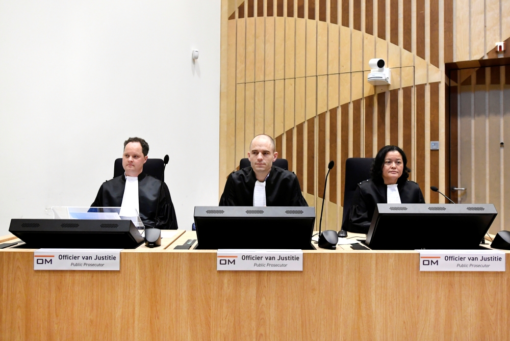 Prosecutors Thijs Berger, Ward Ferdinandusse and Dedy Woei-a-Tsoi attend the criminal trial against four suspects in the July 2014 downing of Malaysia Airlines flight MH17, in Badhoevedorp, Netherlands, March 10, 2020. Reuters/Piroschka Van De Wouw 