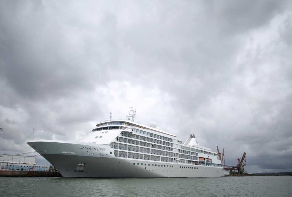 A cruise ship with the Bahamas flag that has been isolated in Brazil's northeastern port of Recife after a passenger showed symptoms similar to those of the coronavirus, according to the Department of Health in Pernambuco state, is seen in Recife, Brazil 