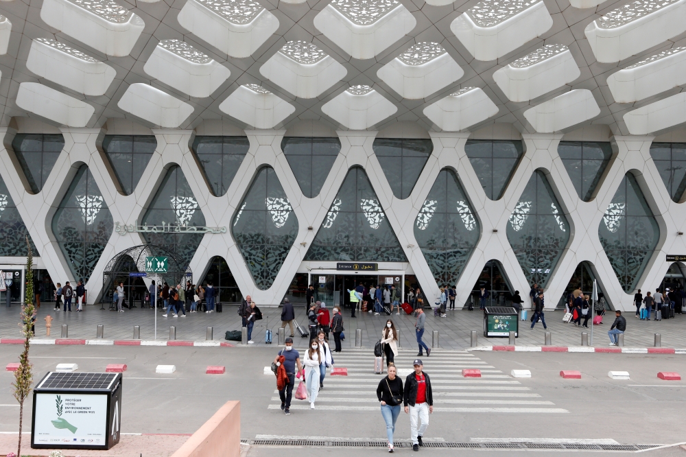 Tourists wait to be repatriated to their countries as Morocco suspends flights to European countries over coronavirus disease (COVID-19) fears, at Marrakech airport, Morocco, March 15, 2020. REUTERS/Youssef Boudlal