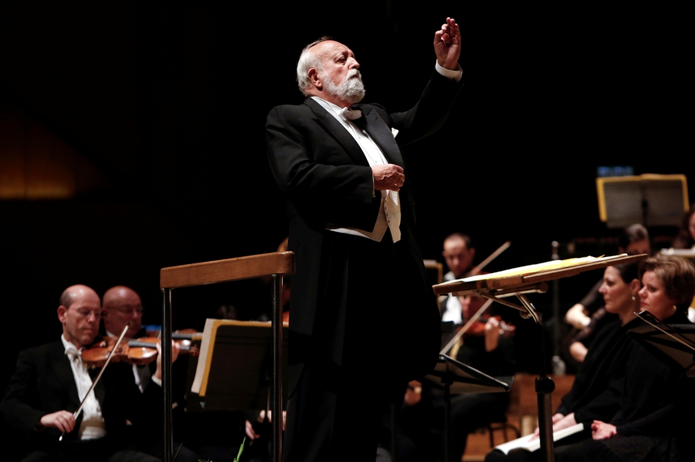 FILE PHOTO: Polish composer Krzysztof Penderecki conducts the Israel Philharmonic Orchestra during a performance of his Polish Requiem in Tel Aviv February 12, 2014. REUTERS/Finbarr O'Reilly/File Photo