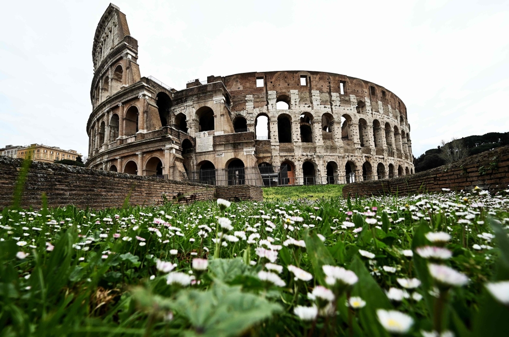 A picture shows the Colisseum in Rome on March 28, 2020, during the country's lockdown aimed at stopping the spread of the COVID-19 (new coronavirus) pandemic./ AFP / Vincenzo PINTO