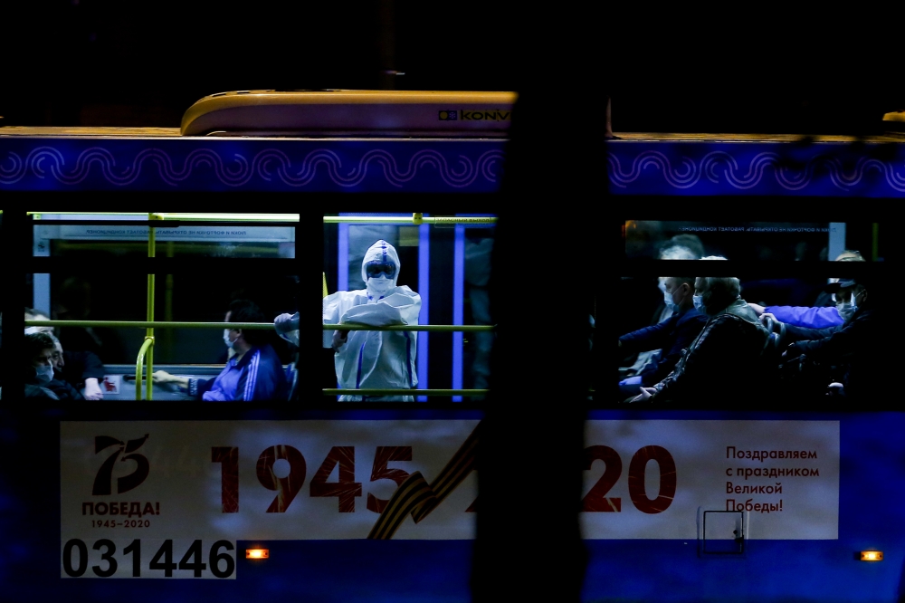Coronavirus (COVID-19) patients of a hospital, where a fire erupted, are being transferred to other hospitals in Moscow, Russia on May 09, 2020. Sefa Karacan - Anadolu 