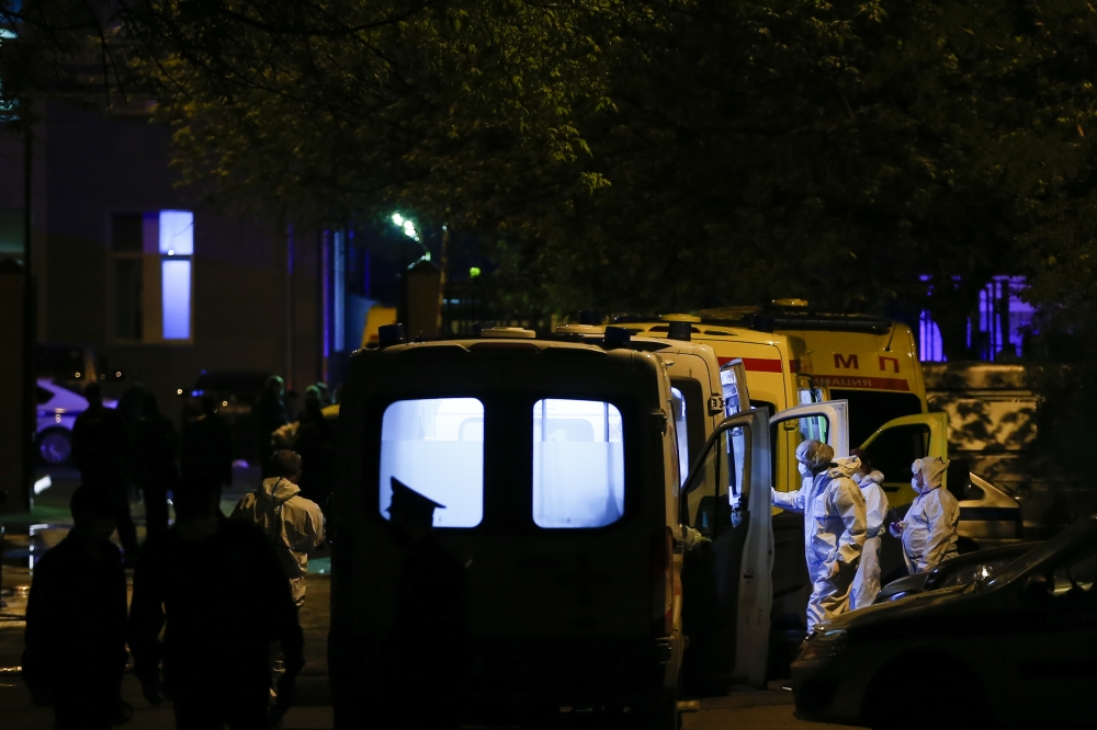 MOSCOW, RUSSIA - MAY 09: Coronavirus (COVID-19) patients of a hospital, where a fire erupted, are being transferred to other hospitals in Moscow, Russia on May 09, 2020. One person was reported killed in the fire incident. Hospital was treating COVID-19 p