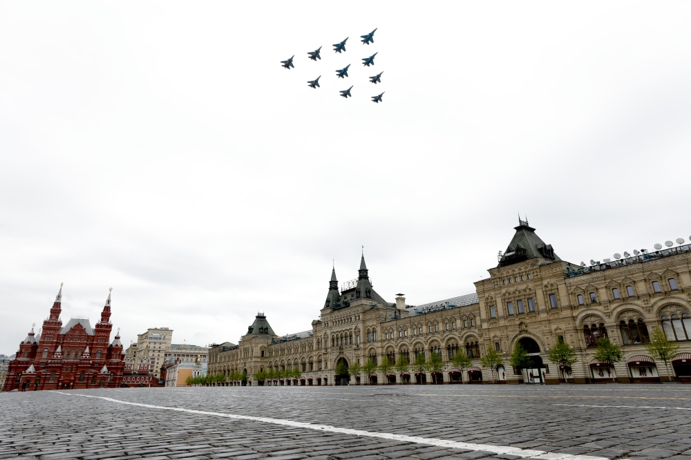 :MOSCOW, RUSSIA - MAY 9 : Russian Sukhoi Su-34, Sukhoi Su-35S and Sukhoi Su-30S jets perform during a Victory Day military parade marking the 75th anniversary of the victory over Nazi Germany in the 1941-1945 Great Patriotic War, the Eastern Front of Worl