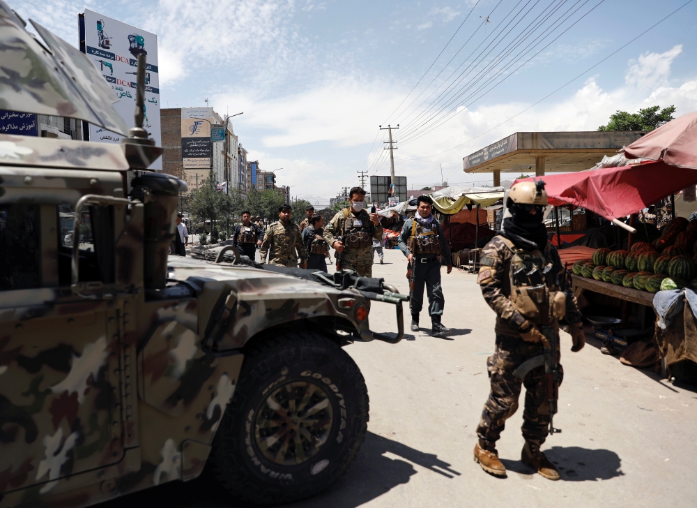 Afghan security forces arrive at the site of an attack in Kabul, Afghanistan May 12, 2020. REUTERS/Mohammad Ismail