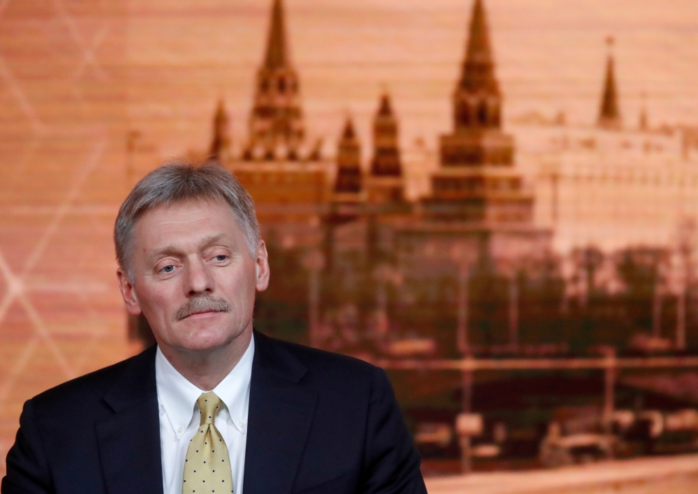 File photo: Kremlin spokesman Dmitry Peskov listens during Russian President Vladimir Putin's annual end-of-year news conference in Moscow, Russia December 19, 2019. Reuters/Evgenia Novozhenina/File Photo 