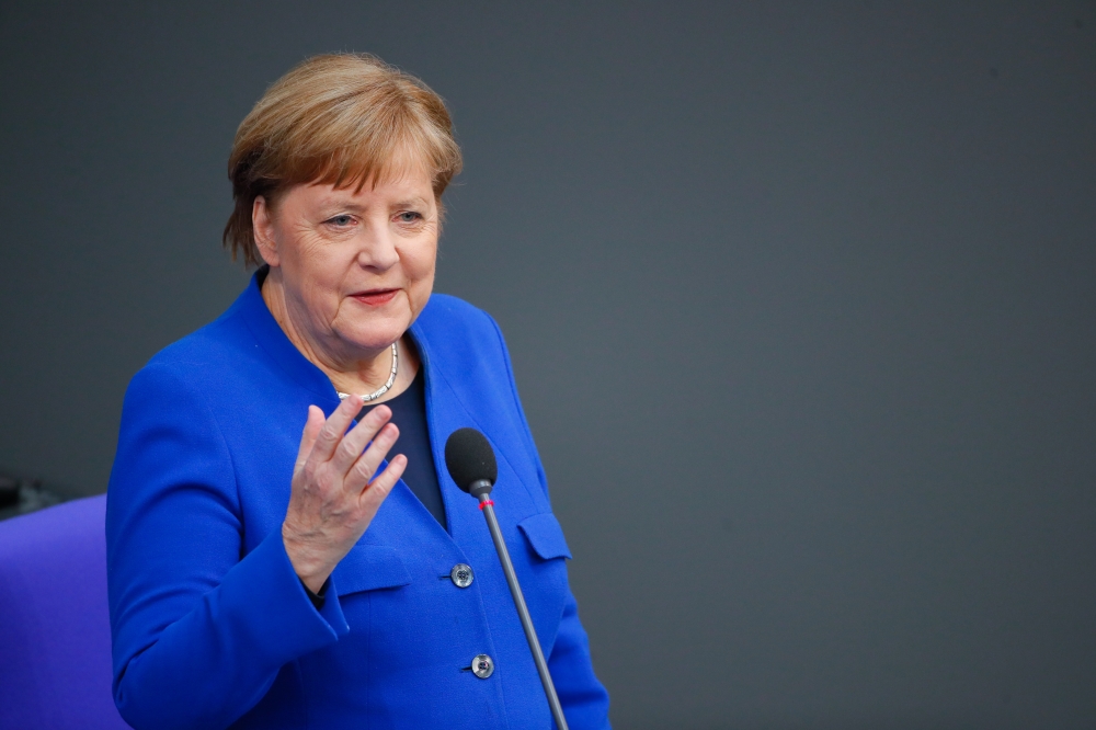German Chancellor Angela Merkel attends a session at the lower house of German parliament, Bundestag, on the coronavirus disease (COVID-19) in Berlin, Germany, May 13, 2020. REUTERS/Hannibal Hanschke