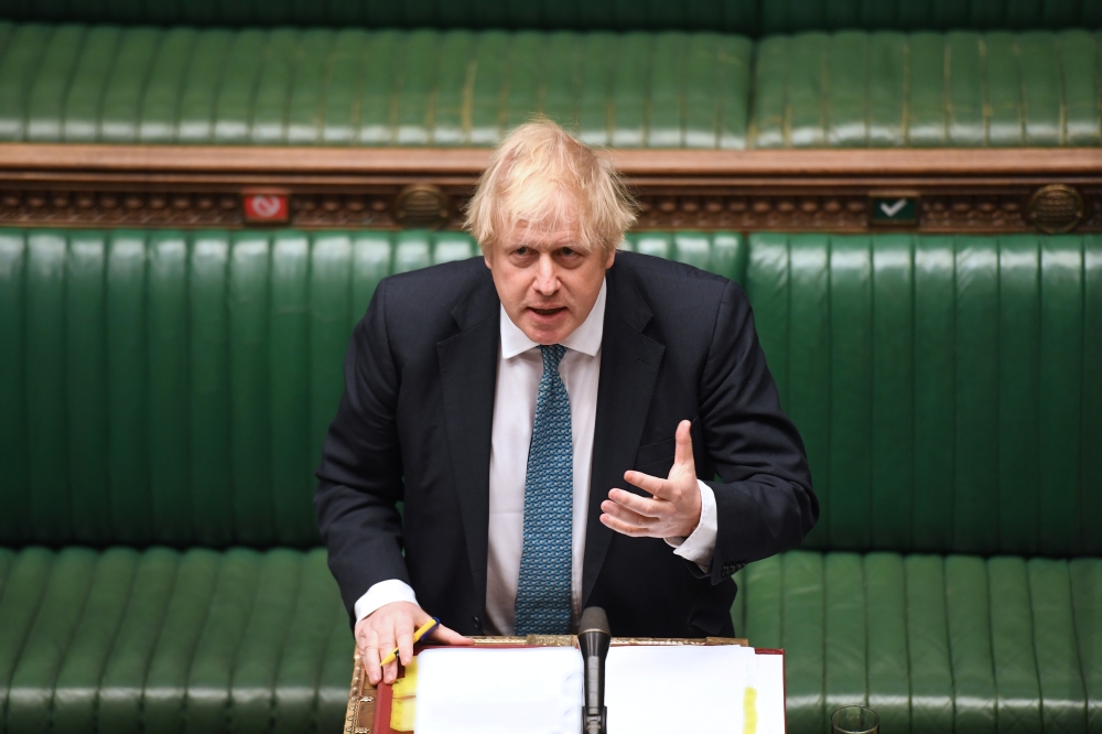 Britain's Prime Minister Boris Johnson speaks during a parliament session, amid the coronavirus disease (COVID-19) outbreak, in the House of Commons Chamber in London, Britain May 13, 2020. UK Parliament/Jessica Taylor/
