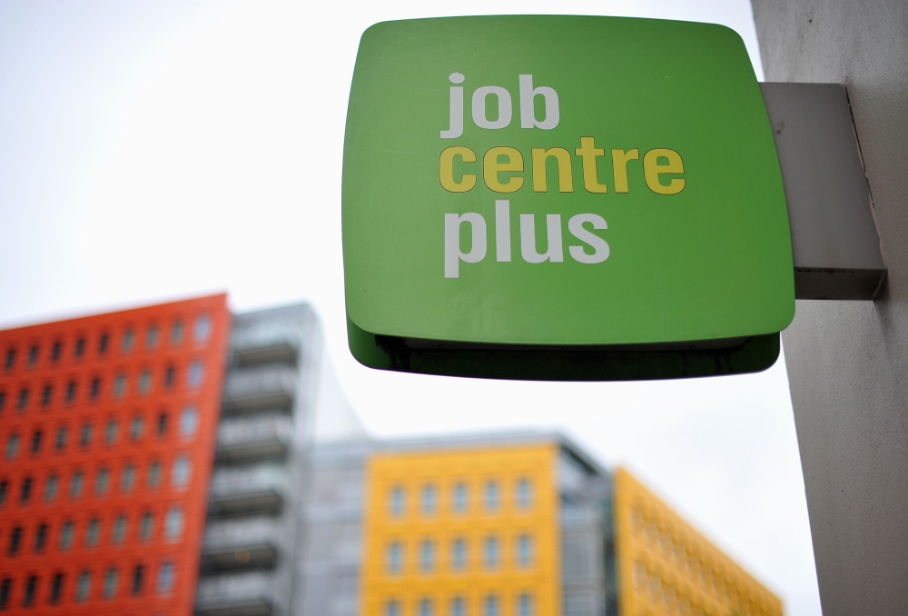 (FILES) In this file photo taken on October 12, 2011 a Job Centre Plus sign is pictured in central London. British unemployment jumped in the first quarter on the back of coronavirus, despite a lockdown being imposed only near the end of the period, offic