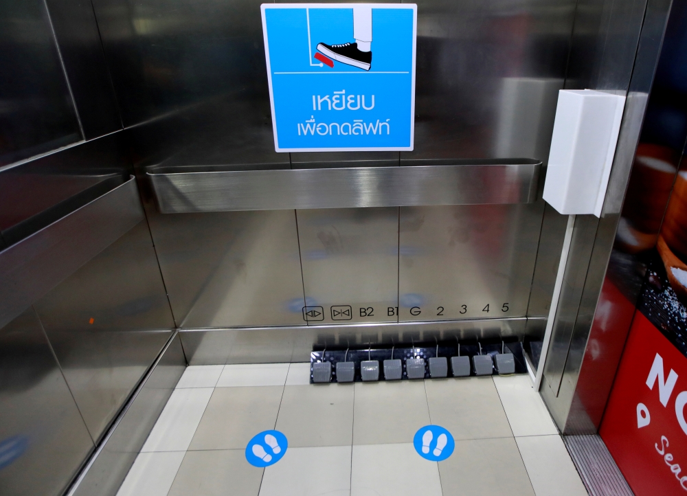 Modified lift switches are seen at a shopping mall after the Thai government eased isolation measures, amid the coronavirus disease (COVID-19) outbreak, in Bangkok, Thailand May 20, 2020. REUTERS/Soe Zeya Tun