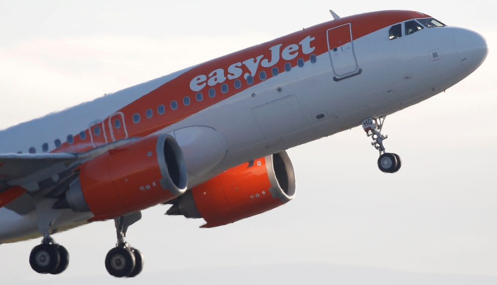 FILE PHOTO: An Easyjet plane takes off from Manchester Airport in Manchester, Britain January 20, 2020. REUTERS/Phil Noble/File Photo
