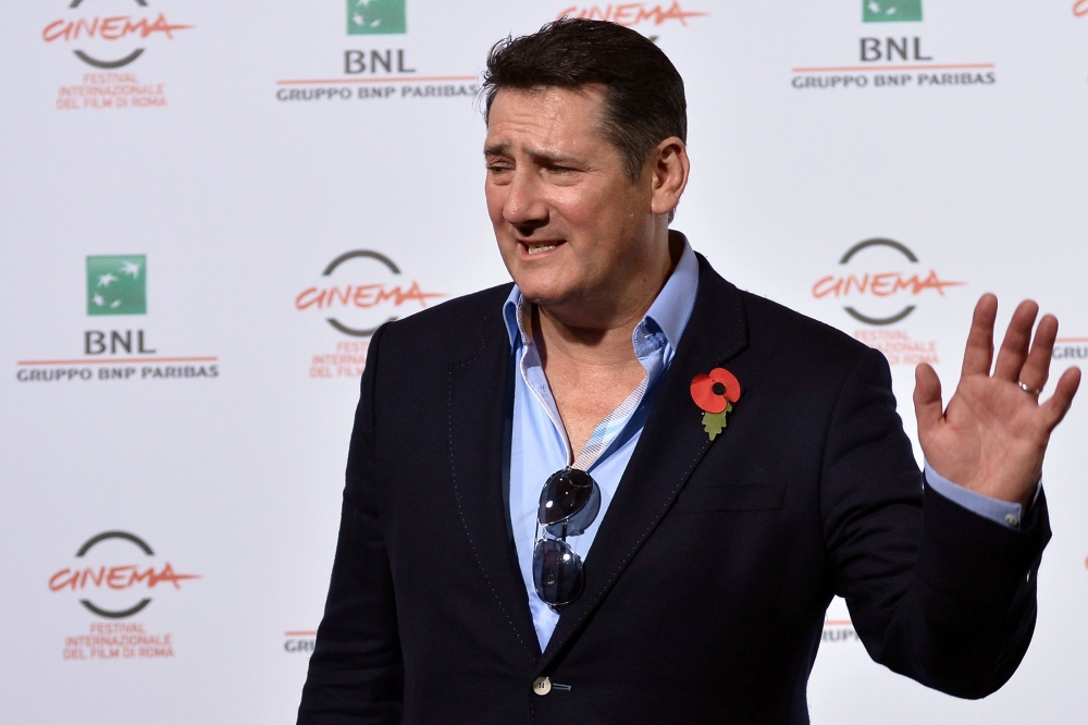 (FILES) In this file photo taken on October 20, 2014, Spandau Ballet's Tony Hadley poses during the photocall of the documentary 
