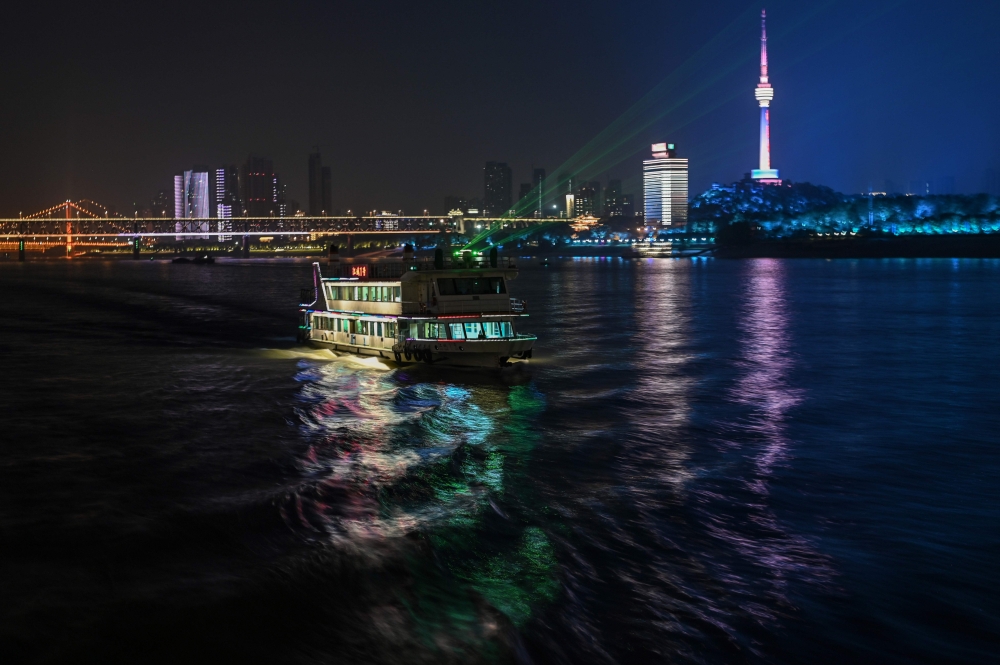 A ferry sails along the Yangtze River in Wuhan, in China’s central Hubei province on May 28, 2020. AFP / Hector RETAMAL