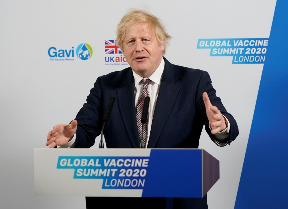 Britain's Prime Minister Boris Johnson delivers his speech to the Global Vaccine Summit (GAVI) via Zoom from the White Room of 10 Downing Street in London, Britain June 4, 2020. Andrew Parsons/10 Downing Street via Reuters