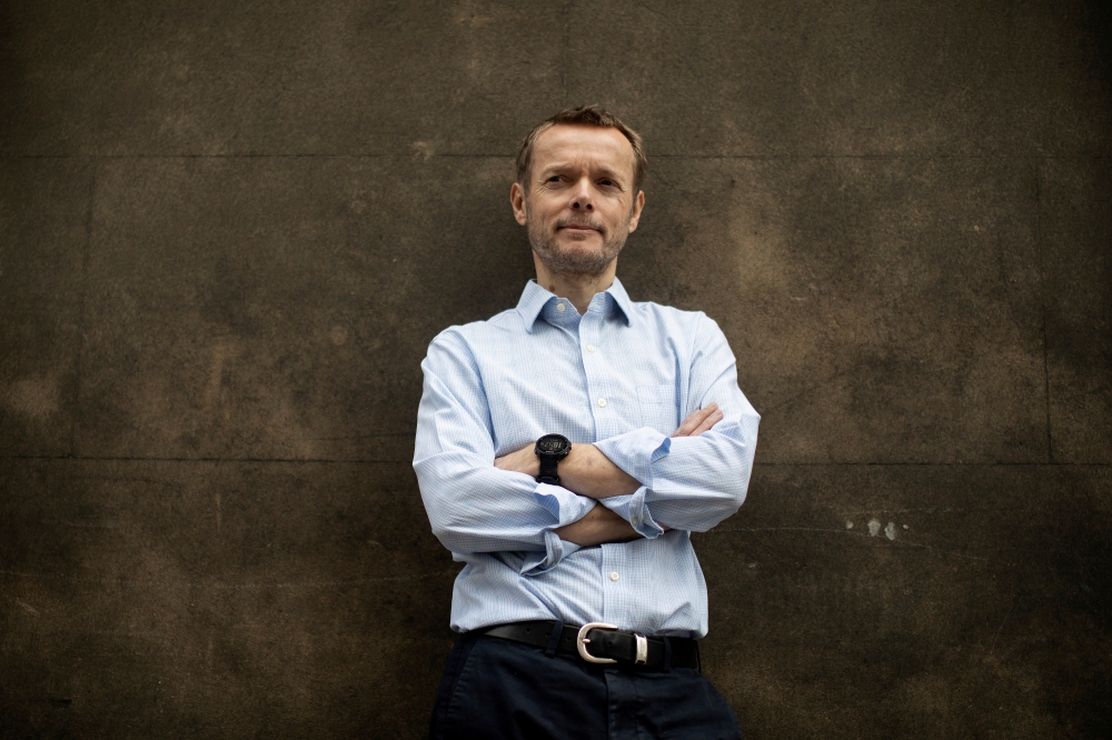 Professor John Edmunds poses for a photograph outside the London School of Hygiene and Tropical Medicine (LSHTM) in London, Britain April 6, 2020. Picture taken April 6, 2020. REUTERS/Simon Dawson/File Photo