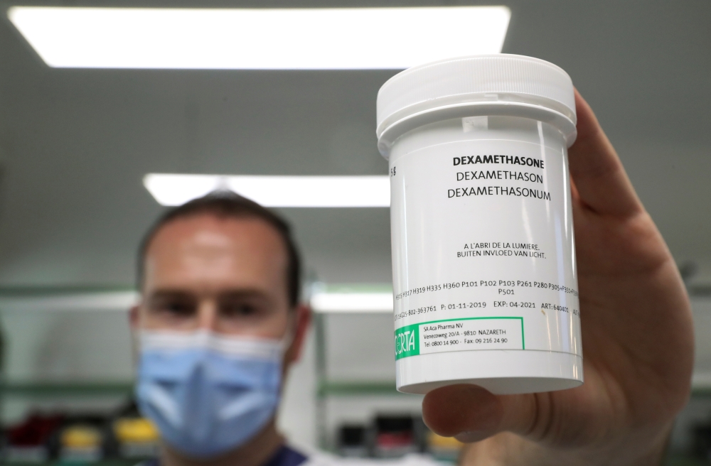A pharmacist displays a box of Dexamethasone at the Erasme Hospital amid the coronavirus disease (COVID-19) outbreak, in Brussels, Belgium, June 16, 2020. REUTERS/Yves Herman
