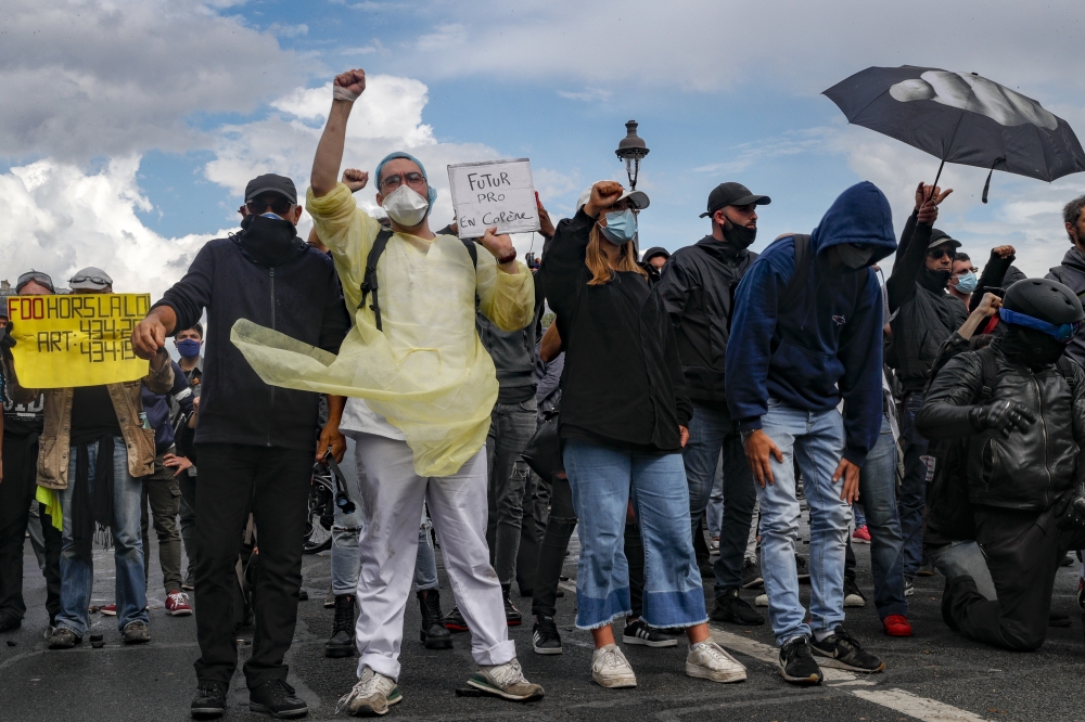 PARIS, FRANCE - JUNE 16: Protesters take part in a demonstration to demand better working conditions for health workers, in Paris, France on June 16, 2020. ( GEOFFROY VAN DER HASSELT - Anadolu Agency )
