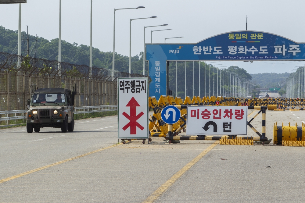 Tensions rise at a military checkpoint on the Unification Bridge near the demilitarized zone (DMZ) after the bombing of the joint liaison office by North Korea the day before on June 17, 2020 in Paju, South Korea. Jong-Hyun Kim - Anadolu
