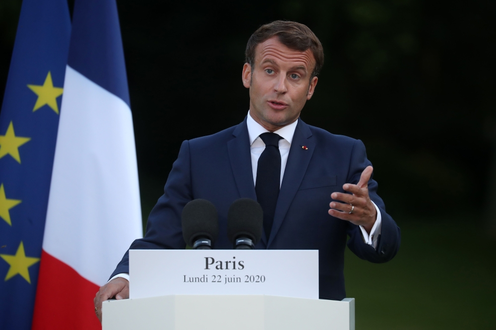 French President Emmanuel Macron gives a joint press conference with his Tunisian counterpart after their meeting at the Elysee Palace, in Paris, on June 22, 2020. / AFP / POOL / Christophe PETIT TESSON