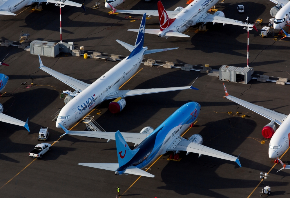 FILE PHOTO: Boeing 737 MAX aircraft are parked in a parking lot at Boeing Field in this aerial photo over Seattle, Washington, U.S., June 11, 2020. REUTERS/Lindsey Wasson/File Photo

