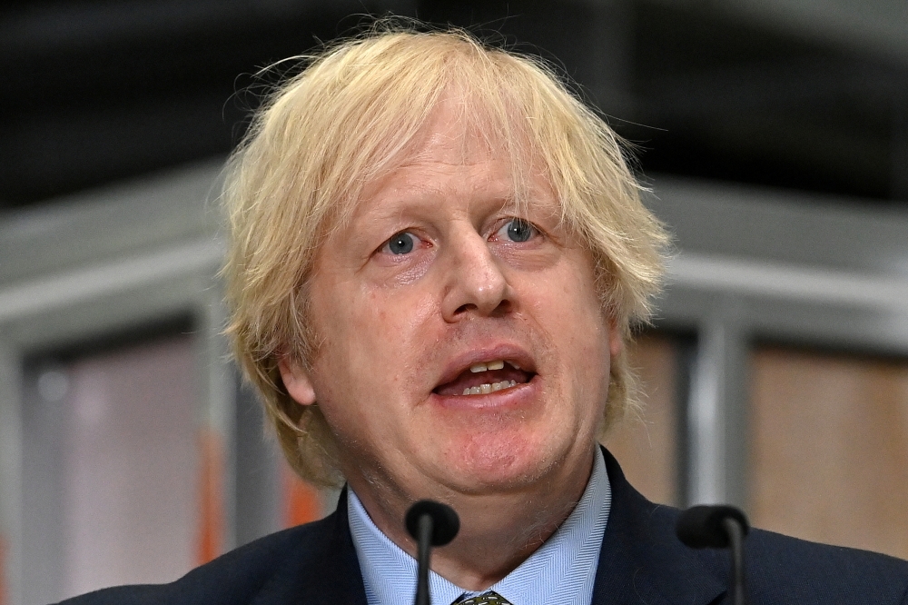 Britain's Prime Minister Boris Johnson delivers a speech during his visit to Dudley College of Technology in Dudley, Britain, June 30, 2020. Paul Ellis/Pool via Reuters