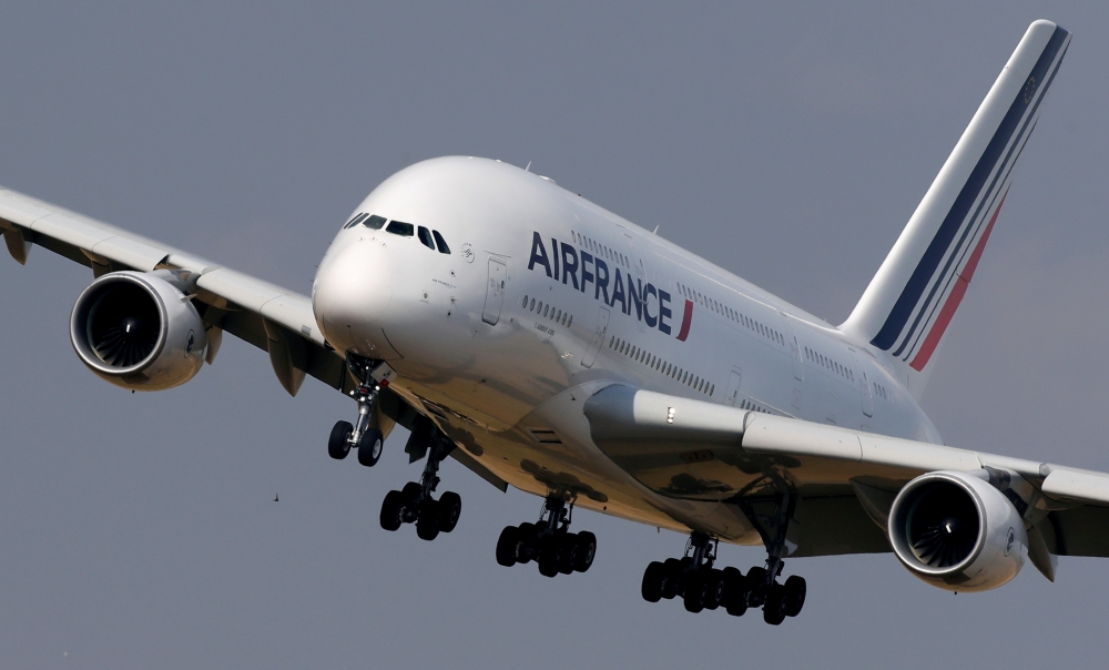 FILE PHOTO: An Air France Airbus A380 aircraft lands at Charles-de-Gaulle airport after its retirement flight, in Roissy, near Paris, June 26, 2020. REUTERS/Christian Hartmann