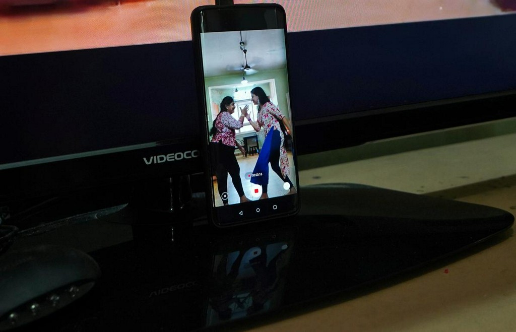 Geetha Sridha, 54, who used to post over a dozen videos on video-sharing app tiktok, and her daughter Sarada Sridhar are seen in a mobile phone's screen as they make a video that they said will upload on an Indian app, after India banned dozens of Chinese