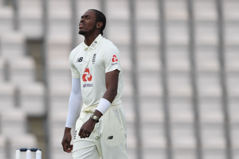 In this file photo taken on July 10, 2020 England's Jofra Archer reacts on the third day of the first Test cricket match between England and the West Indies at the Ageas Bowl in Southampton, southwest England. / AFP / POOL / Mike Hewitt /
