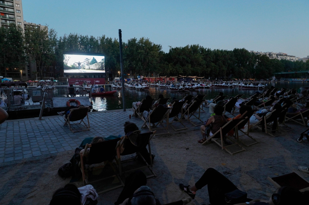 People attend the screening of the French movie 