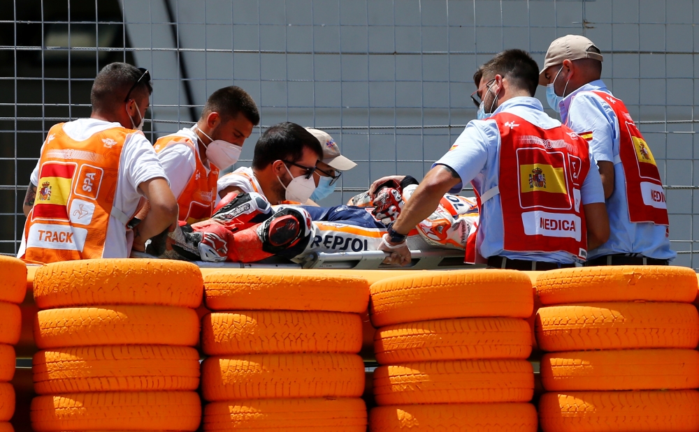 MotoGP - Spanish Grand Prix - Circuito de Jerez, Jerez, Spain - July 19, 2020 Repsol Honda's Marc Marquez is stretchered into an ambulance after crashing out during the race REUTERS/Marcelo Del Pozo