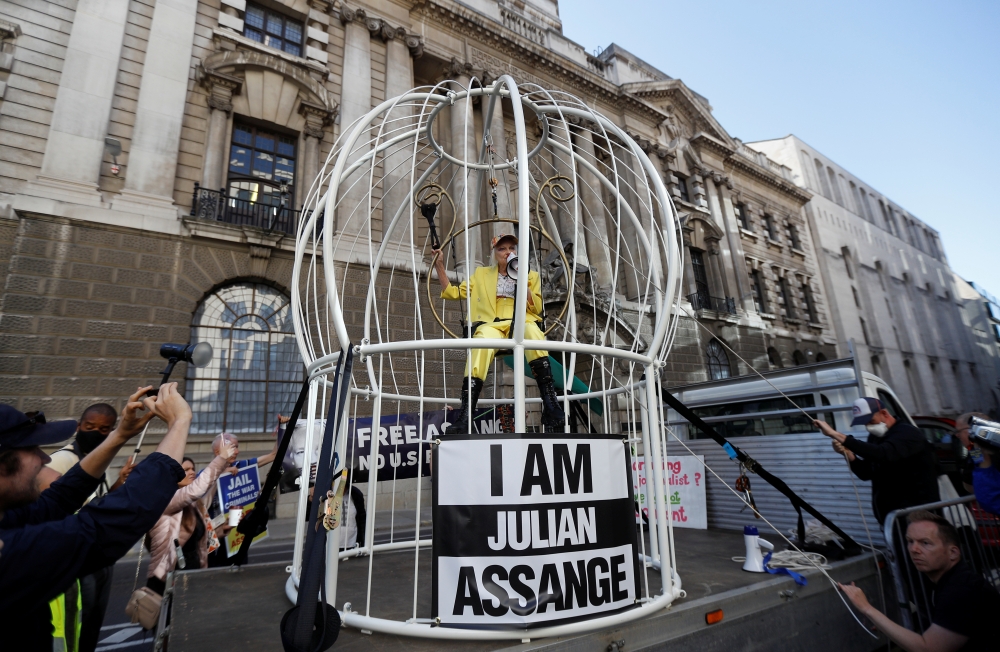Vivienne Westwood uses a bullhorn as she demonstrates outside the Old Bailey in support of Julian Assange, in London, Britain, July 21, 2020. REUTERS/Peter Nicholls