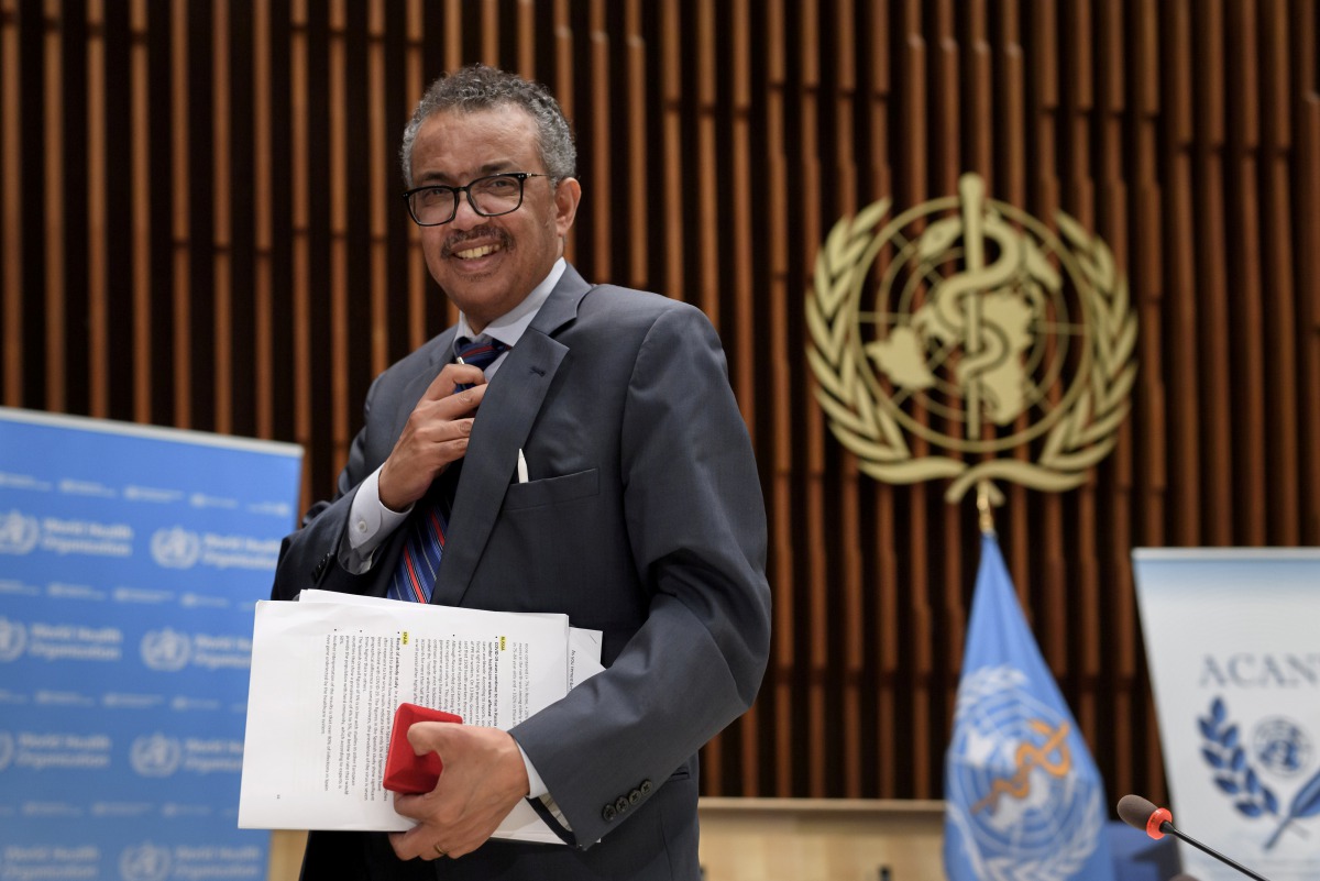 FILE PHOTO: World Health Organization (WHO) Director-General Tedros Adhanom Ghebreyesus leaves a news conference organized by Geneva Association of United Nations Correspondents (ACANU) amid the COVID-19 outbreak, caused by the novel coronavirus, at the W