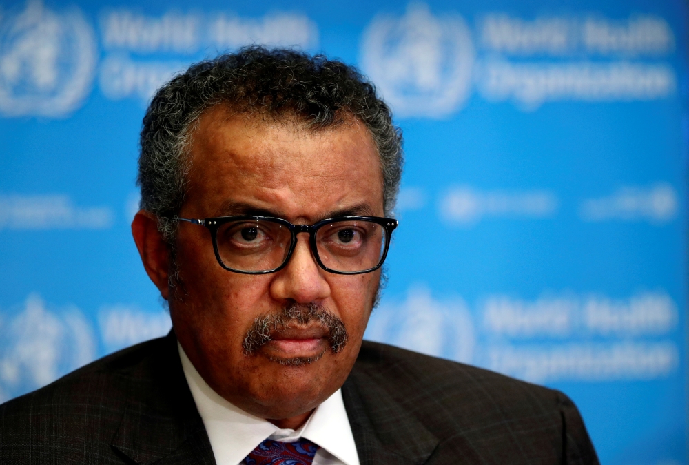 FILE PHOTO: Director General of the World Health Organization (WHO) Tedros Adhanom Ghebreyesus attends a news conference on the situation of the coronavirus (COVID-2019), in Geneva, Switzerland, February 28, 2020. REUTERS/Denis Balibouse/File Photo