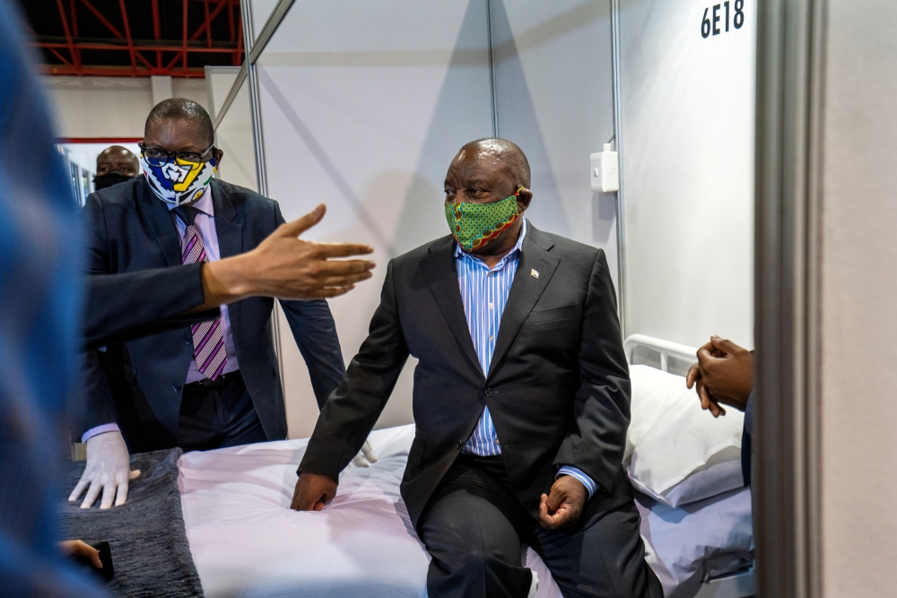 South African President Cyril Ramaphosa visits a COVID-19 treatment facility in Johannesburg, South Africa. (Jerome Delay/Pool via REUTERS/File Photo)