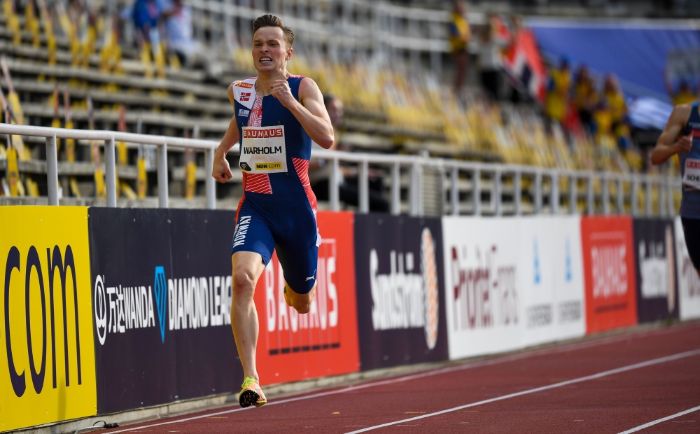 Norway's Karsten Warholm powers away from his competitors to win the men 400m event during the Diamond League Athletics Meeting at Stockholm stadium on August 23, 2020. / AFP / Jonathan NACKSTRAND