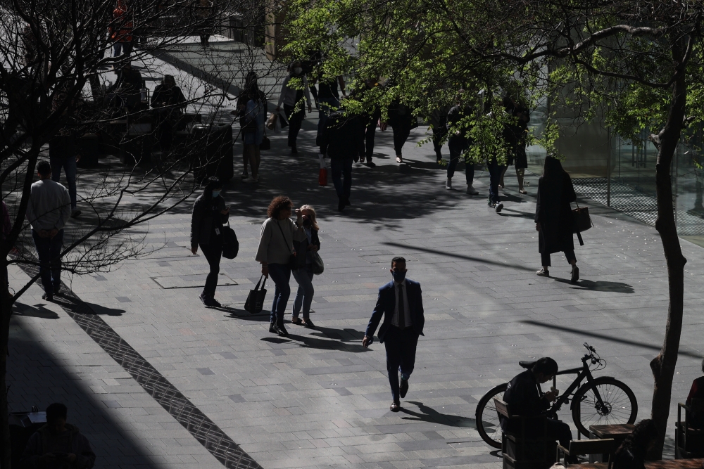 People walk through the city centre as the state of New South Wales continues to report low numbers for new daily cases of the coronavirus disease (COVID-19), in Sydney, Australia, August 28, 2020. REUTERS/Loren Elliott