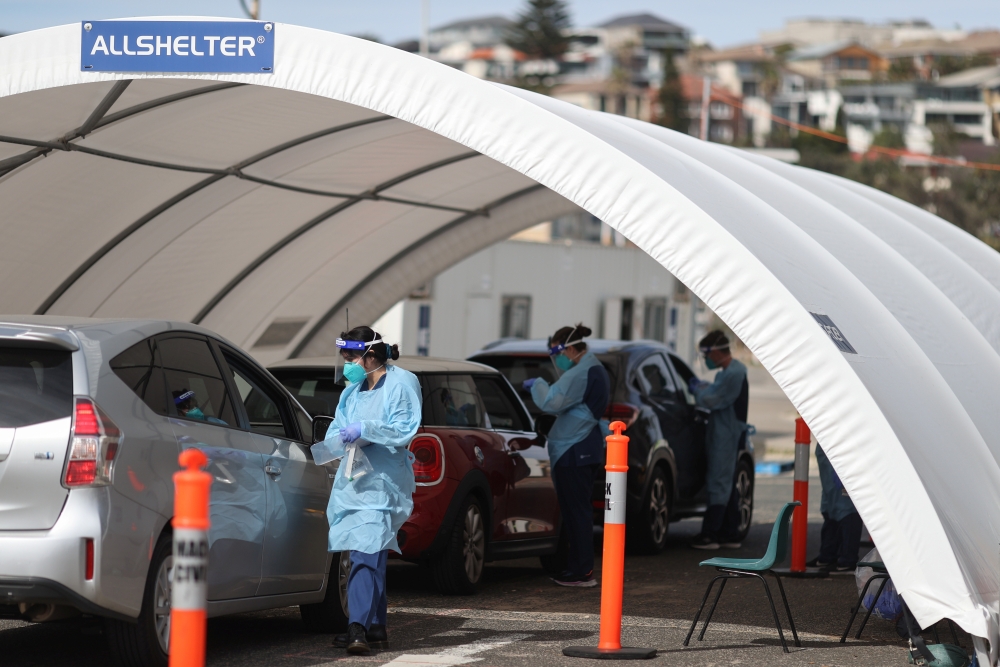 Medical personnel are seen at the Bondi Beach coronavirus disease (COVID-19) drive-through testing centre, as the state of New South Wales continues to report relatively low numbers for new daily cases, in Sydney, Australia, September 2, 2020. REUTERS/Lor