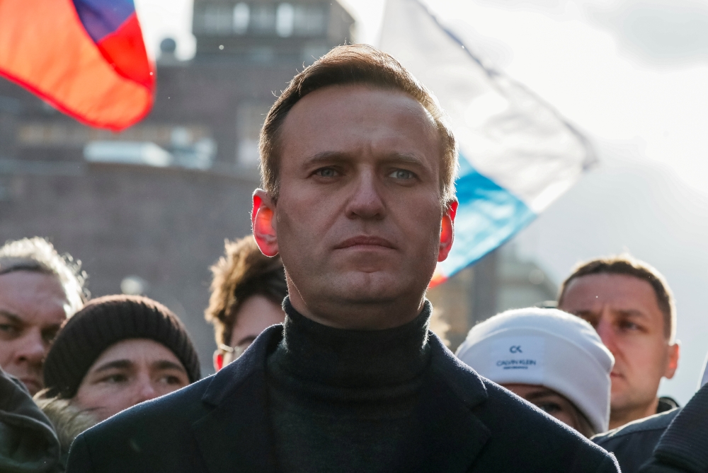 FILE PHOTO: Russian opposition politician Alexei Navalny takes part in a rally to mark the 5th anniversary of opposition politician Boris Nemtsov's murder and to protest against proposed amendments to the country's constitution, in Moscow, Russia February