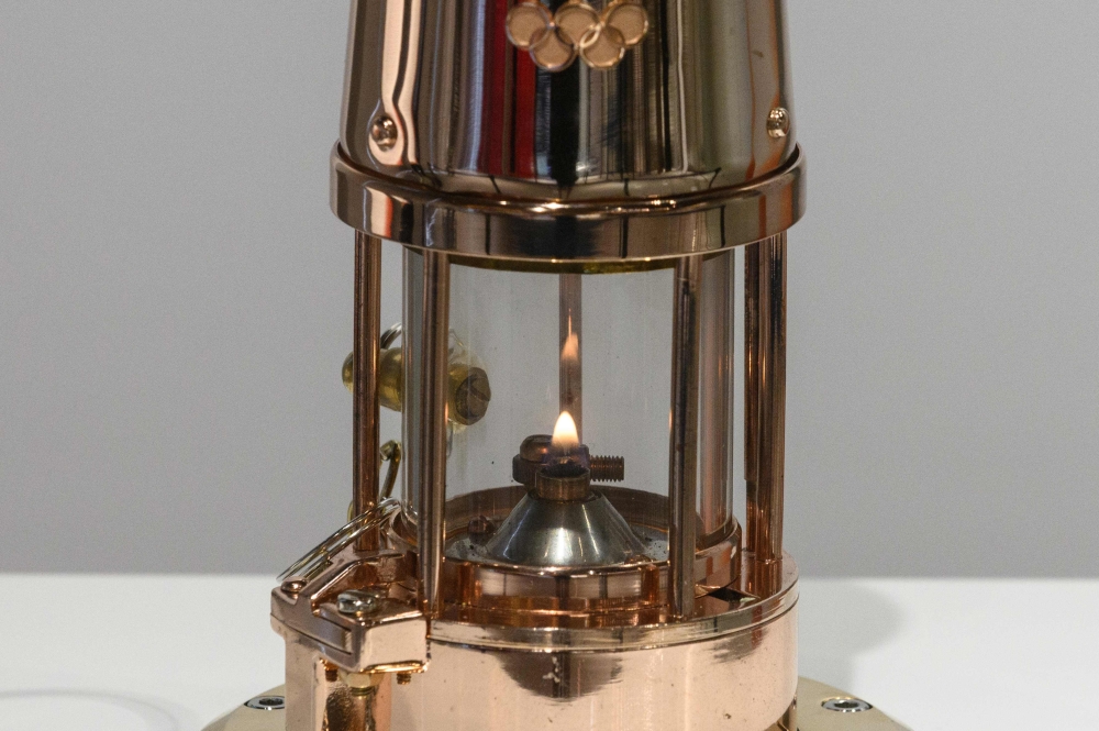 A lantern bearing the Tokyo 2020 Olympic flame is seen on display at the Olympic Museum in Tokyo on September 1, 2020.