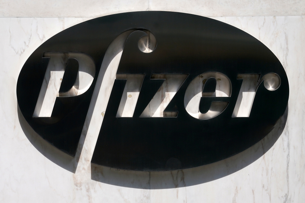 A sign is pictured outside Pfizer Headquarters in the Manhattan borough of New York City, New York, U.S., July 22, 2020. REUTERS/Carlo Allegri/File Photo