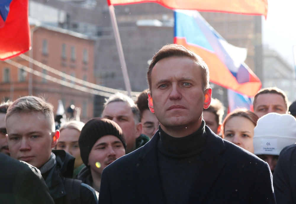 FILE PHOTO: Russian opposition politician Alexei Navalny takes part in a rally to mark the 5th anniversary of opposition politician Boris Nemtsov's murder and to protest against proposed amendments to the country's constitution, in Moscow, Russia February