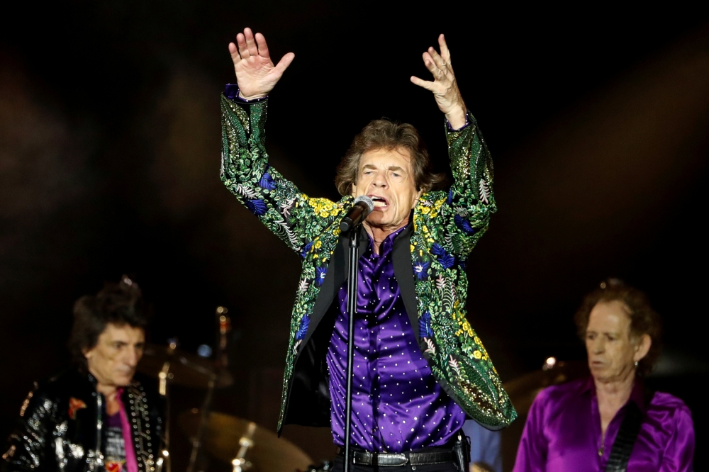 Mick Jagger of the Rolling Stones performs between band members Keith Richards and Ronnie Wood during their No Filter U.S. Tour at Rose Bowl Stadium in Pasadena, California, U.S., August 22, 2019. REUTERS/Mario Anzuoni/File Photo