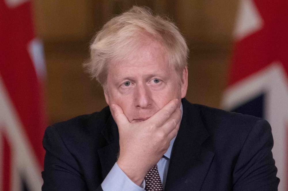 Britain's Prime Minister Boris Johnson speaks during a virtual press conference at Downing Street in central London on September 9, 2020 following an announcement of further restrictions on social gatherings in England due to an uptick in cases of the nov