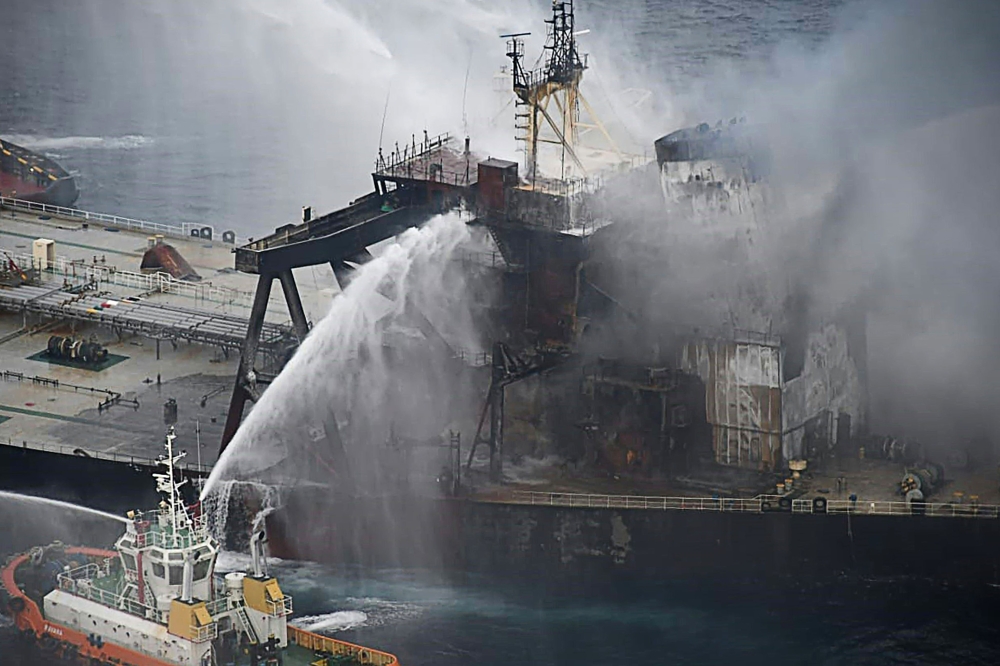 Fireboats battling to extinguish a fire on the Panamanian-registered crude oil tanker New Diamond. AFP 